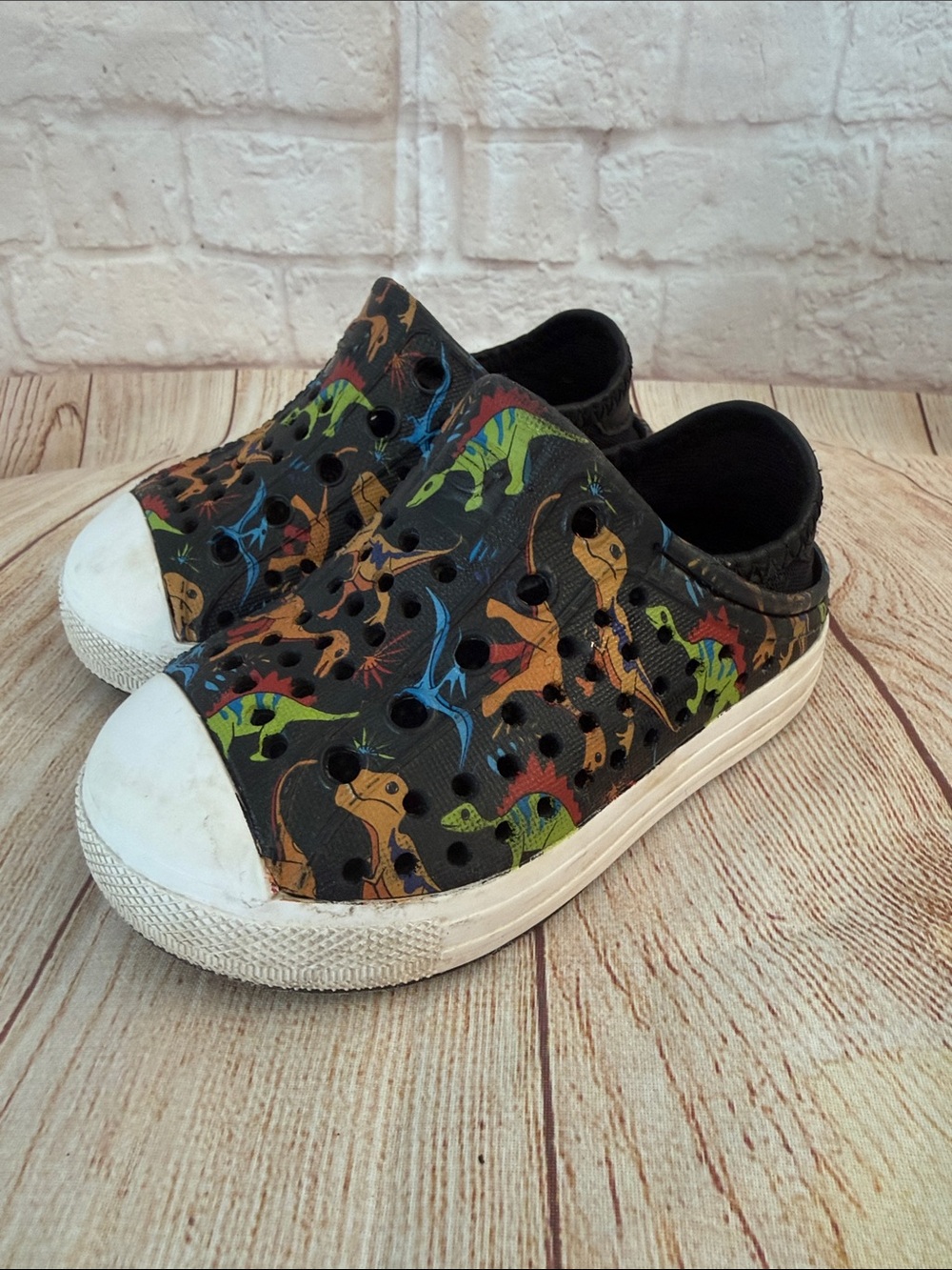 Skechers Black Slip-On Sneakers with Multicolor Dinosaur Print- Size 5 Baby